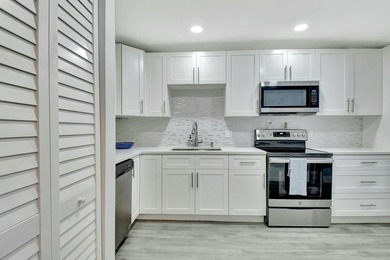 This beautifully renovated 2-bedroom, 2-bathroom main-level on Hunters Run Golf and Country Club in Florida - for sale on GolfHomes.com, golf home, golf lot