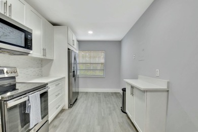 This beautifully renovated 2-bedroom, 2-bathroom main-level on Hunters Run Golf and Country Club in Florida - for sale on GolfHomes.com, golf home, golf lot