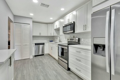 This beautifully renovated 2-bedroom, 2-bathroom main-level on Hunters Run Golf and Country Club in Florida - for sale on GolfHomes.com, golf home, golf lot