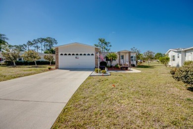 This beautiful 2-bedroom, 2-bathroom home is located in the on Lake Fairways Country Club in Florida - for sale on GolfHomes.com, golf home, golf lot