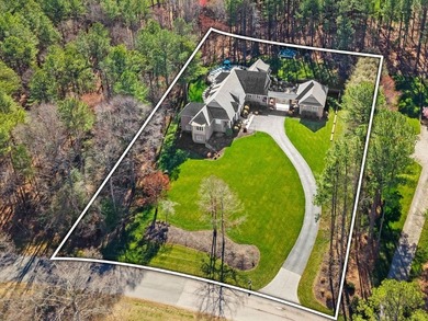 Experience the pinnacle of luxury living in this custom-built on The Foundry Golf Club in Virginia - for sale on GolfHomes.com, golf home, golf lot
