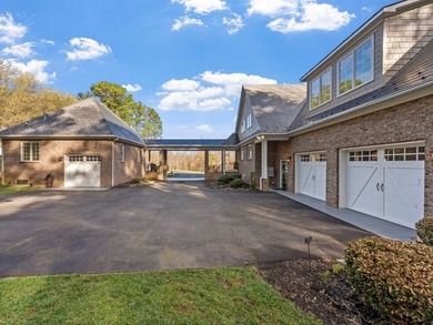 Experience the pinnacle of luxury living in this custom-built on The Foundry Golf Club in Virginia - for sale on GolfHomes.com, golf home, golf lot