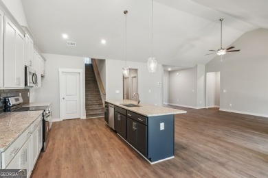 Welcome home to a beautifully crafted new construction home by a on Traditions of Braselton Golf Club in Georgia - for sale on GolfHomes.com, golf home, golf lot