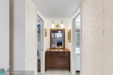 Discover the potential in this ground-floor 2-bedroom 2 bath on Palm-Aire Country Club and Resort - Palms in Florida - for sale on GolfHomes.com, golf home, golf lot