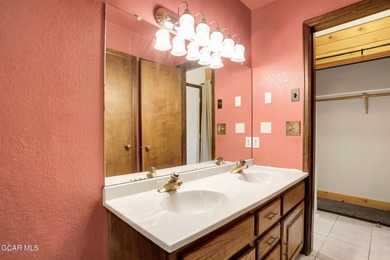 Welcome to your high-country hideaway-where the Rockies are your on Headwaters Golf Course At Granby Ranch in Colorado - for sale on GolfHomes.com, golf home, golf lot