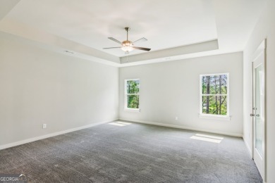 Welcome home to a beautifully crafted new construction home by a on Traditions of Braselton Golf Club in Georgia - for sale on GolfHomes.com, golf home, golf lot