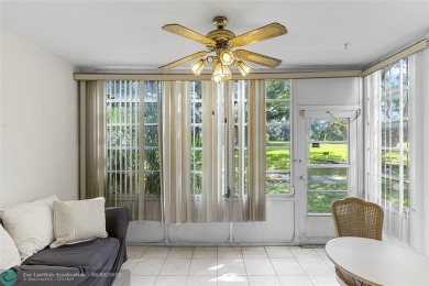 Discover the potential in this ground-floor 2-bedroom 2 bath on Palm-Aire Country Club and Resort - Palms in Florida - for sale on GolfHomes.com, golf home, golf lot