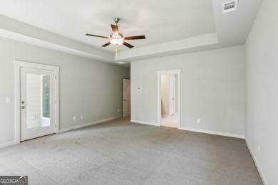 Welcome home to a beautifully crafted new construction home by a on Traditions of Braselton Golf Club in Georgia - for sale on GolfHomes.com, golf home, golf lot