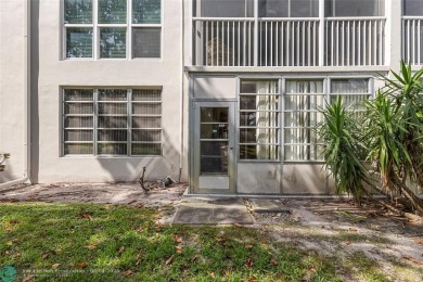 Discover the potential in this ground-floor 2-bedroom 2 bath on Palm-Aire Country Club and Resort - Palms in Florida - for sale on GolfHomes.com, golf home, golf lot