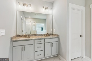 Welcome home to a beautifully crafted new construction home by a on Traditions of Braselton Golf Club in Georgia - for sale on GolfHomes.com, golf home, golf lot