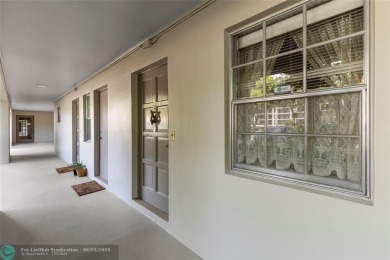 Discover the potential in this ground-floor 2-bedroom 2 bath on Palm-Aire Country Club and Resort - Palms in Florida - for sale on GolfHomes.com, golf home, golf lot