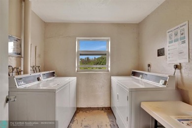 Discover the potential in this ground-floor 2-bedroom 2 bath on Palm-Aire Country Club and Resort - Palms in Florida - for sale on GolfHomes.com, golf home, golf lot