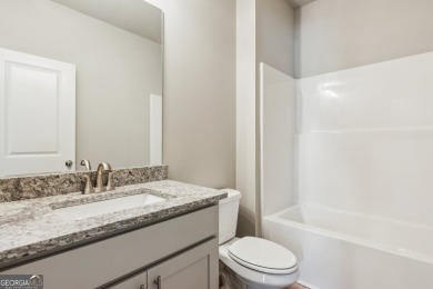 Welcome home to a beautifully crafted new construction home by a on Traditions of Braselton Golf Club in Georgia - for sale on GolfHomes.com, golf home, golf lot