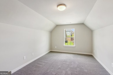 Welcome home to a beautifully crafted new construction home by a on Traditions of Braselton Golf Club in Georgia - for sale on GolfHomes.com, golf home, golf lot