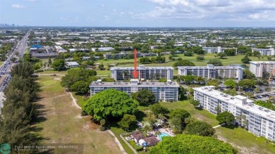 Discover the potential in this ground-floor 2-bedroom 2 bath on Palm-Aire Country Club and Resort - Palms in Florida - for sale on GolfHomes.com, golf home, golf lot