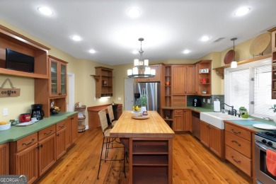Welcome to your dream home-a true Southern Charmer nestled in on Eagles Landing Country Club in Georgia - for sale on GolfHomes.com, golf home, golf lot