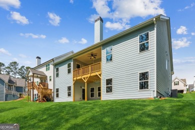 Welcome home to a beautifully crafted new construction home by a on Traditions of Braselton Golf Club in Georgia - for sale on GolfHomes.com, golf home, golf lot