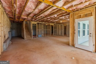 Welcome home to a beautifully crafted new construction home by a on Traditions of Braselton Golf Club in Georgia - for sale on GolfHomes.com, golf home, golf lot