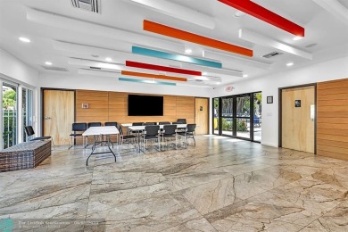 Discover the potential in this ground-floor 2-bedroom 2 bath on Palm-Aire Country Club and Resort - Palms in Florida - for sale on GolfHomes.com, golf home, golf lot