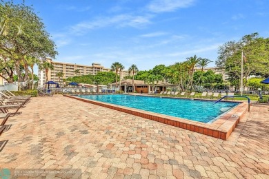 Discover the potential in this ground-floor 2-bedroom 2 bath on Palm-Aire Country Club and Resort - Palms in Florida - for sale on GolfHomes.com, golf home, golf lot