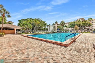 Discover the potential in this ground-floor 2-bedroom 2 bath on Palm-Aire Country Club and Resort - Palms in Florida - for sale on GolfHomes.com, golf home, golf lot