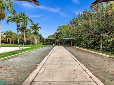 Discover the potential in this ground-floor 2-bedroom 2 bath on Palm-Aire Country Club and Resort - Palms in Florida - for sale on GolfHomes.com, golf home, golf lot