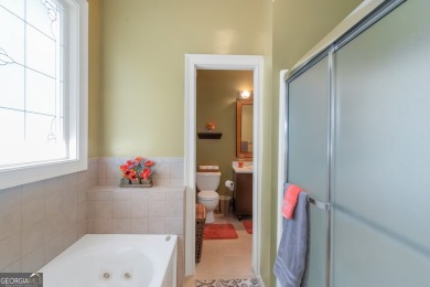 Welcome to your dream home-a true Southern Charmer nestled in on Eagles Landing Country Club in Georgia - for sale on GolfHomes.com, golf home, golf lot