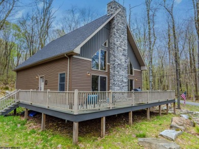 Welcome to 'Suncrest Chalet', a nearly-new escape nestled inside on Alpine Lake Resort in West Virginia - for sale on GolfHomes.com, golf home, golf lot