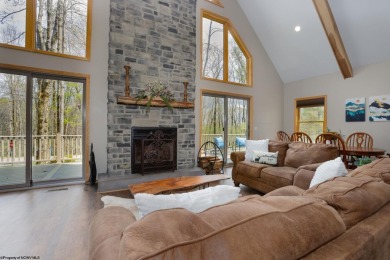 Welcome to 'Suncrest Chalet', a nearly-new escape nestled inside on Alpine Lake Resort in West Virginia - for sale on GolfHomes.com, golf home, golf lot