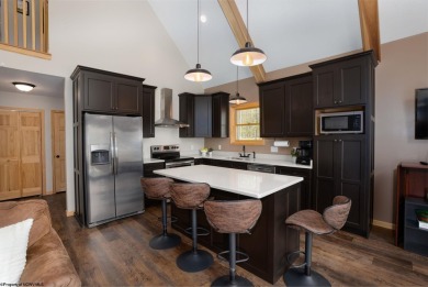Welcome to 'Suncrest Chalet', a nearly-new escape nestled inside on Alpine Lake Resort in West Virginia - for sale on GolfHomes.com, golf home, golf lot