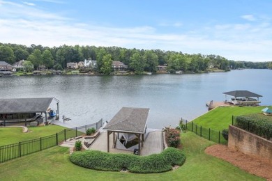 Discover Your Lakeside Paradise! This stunning home, nestled on on Fairfield Plantation Golf and Country Club in Georgia - for sale on GolfHomes.com, golf home, golf lot