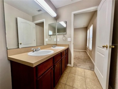 Live in this beautiful townhome in the desirable community of on Harmony Golf Preserve in Florida - for sale on GolfHomes.com, golf home, golf lot