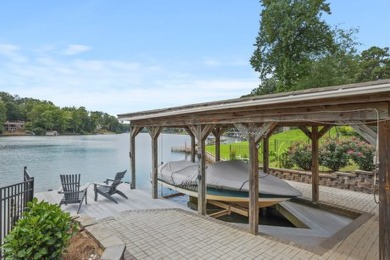 Discover Your Lakeside Paradise! This stunning home, nestled on on Fairfield Plantation Golf and Country Club in Georgia - for sale on GolfHomes.com, golf home, golf lot