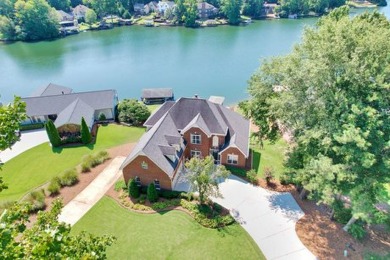 Discover Your Lakeside Paradise! This stunning home, nestled on on Fairfield Plantation Golf and Country Club in Georgia - for sale on GolfHomes.com, golf home, golf lot