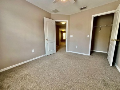 Live in this beautiful townhome in the desirable community of on Harmony Golf Preserve in Florida - for sale on GolfHomes.com, golf home, golf lot
