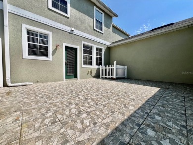 Live in this beautiful townhome in the desirable community of on Harmony Golf Preserve in Florida - for sale on GolfHomes.com, golf home, golf lot