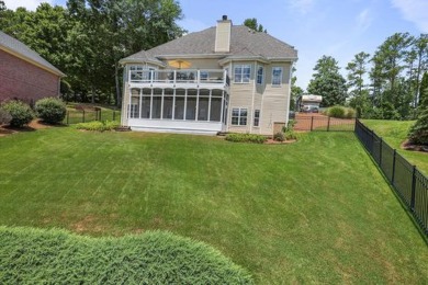 Discover Your Lakeside Paradise! This stunning home, nestled on on Fairfield Plantation Golf and Country Club in Georgia - for sale on GolfHomes.com, golf home, golf lot