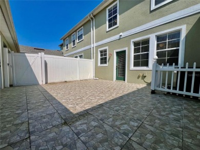 Live in this beautiful townhome in the desirable community of on Harmony Golf Preserve in Florida - for sale on GolfHomes.com, golf home, golf lot