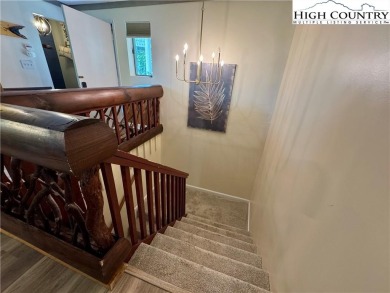 Escape to the mountains in this charming fully furnished on Sugar Mountain Golf Course in North Carolina - for sale on GolfHomes.com, golf home, golf lot