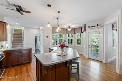 Nestled in a quiet cul-de-sac and backed by a serene pond shaded on Members Club At St. James Plantation in North Carolina - for sale on GolfHomes.com, golf home, golf lot