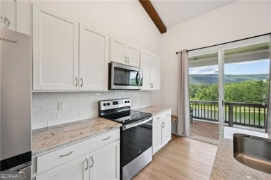 COME GET THIS AMAZING GOLF COURSE COTTAGE WITH SPECTACULAR VIEWS on The Highlands Course at Lake Arrowhead in Georgia - for sale on GolfHomes.com, golf home, golf lot