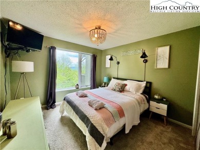 Escape to the mountains in this charming fully furnished on Sugar Mountain Golf Course in North Carolina - for sale on GolfHomes.com, golf home, golf lot