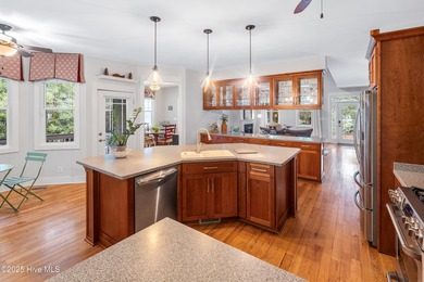 Nestled in a quiet cul-de-sac and backed by a serene pond shaded on Members Club At St. James Plantation in North Carolina - for sale on GolfHomes.com, golf home, golf lot