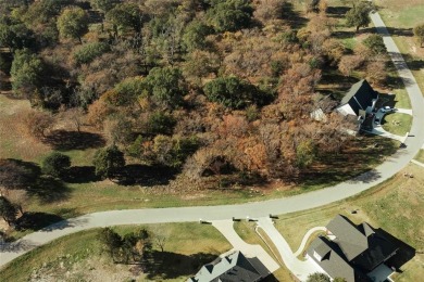 Discover the perfect balance of privacy and luxury in the on Cedar Creek Country Club in Texas - for sale on GolfHomes.com, golf home, golf lot