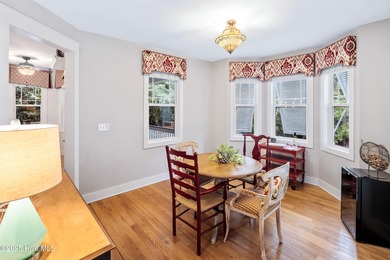 Nestled in a quiet cul-de-sac and backed by a serene pond shaded on Members Club At St. James Plantation in North Carolina - for sale on GolfHomes.com, golf home, golf lot