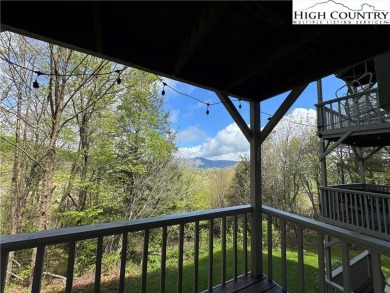 Escape to the mountains in this charming fully furnished on Sugar Mountain Golf Course in North Carolina - for sale on GolfHomes.com, golf home, golf lot