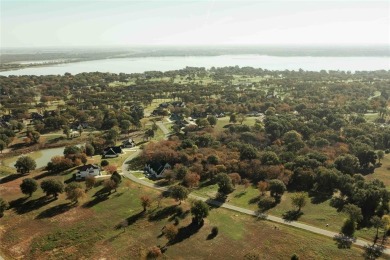 Discover the perfect balance of privacy and luxury in the on Cedar Creek Country Club in Texas - for sale on GolfHomes.com, golf home, golf lot