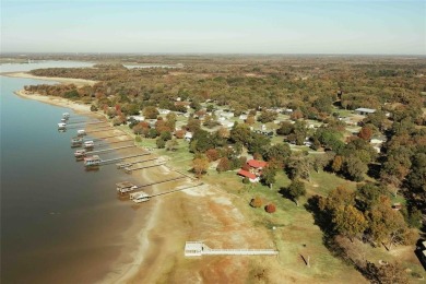 Discover the perfect balance of privacy and luxury in the on Cedar Creek Country Club in Texas - for sale on GolfHomes.com, golf home, golf lot