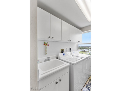 BREATHTAKING VIEWS OF THE RIVER AND DOWNTOWN FORT MYERS ARE on Gulf Harbour Yacht and Country Club in Florida - for sale on GolfHomes.com, golf home, golf lot