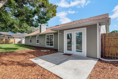 The beautiful curb appeal is the first thing you notice about on Turkey Creek Golf and Country Club in Florida - for sale on GolfHomes.com, golf home, golf lot